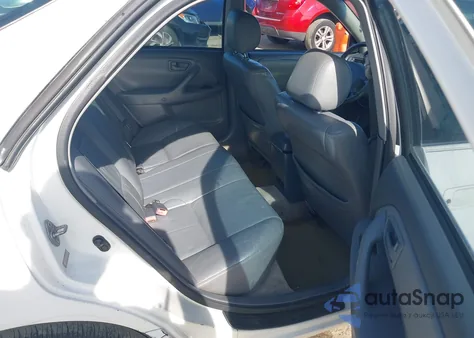 2000 Toyota Camry Xle z USA, uszkodzony, nr VIN JT2BG28K2Y0493612